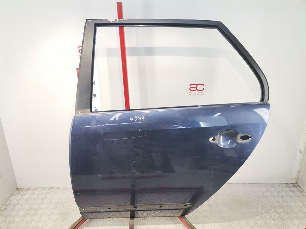 Дверь задняя левая Kia Carens 2 (UN)