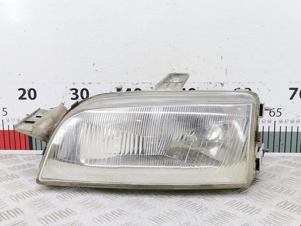 Фара левая Fiat Punto 1 (176)