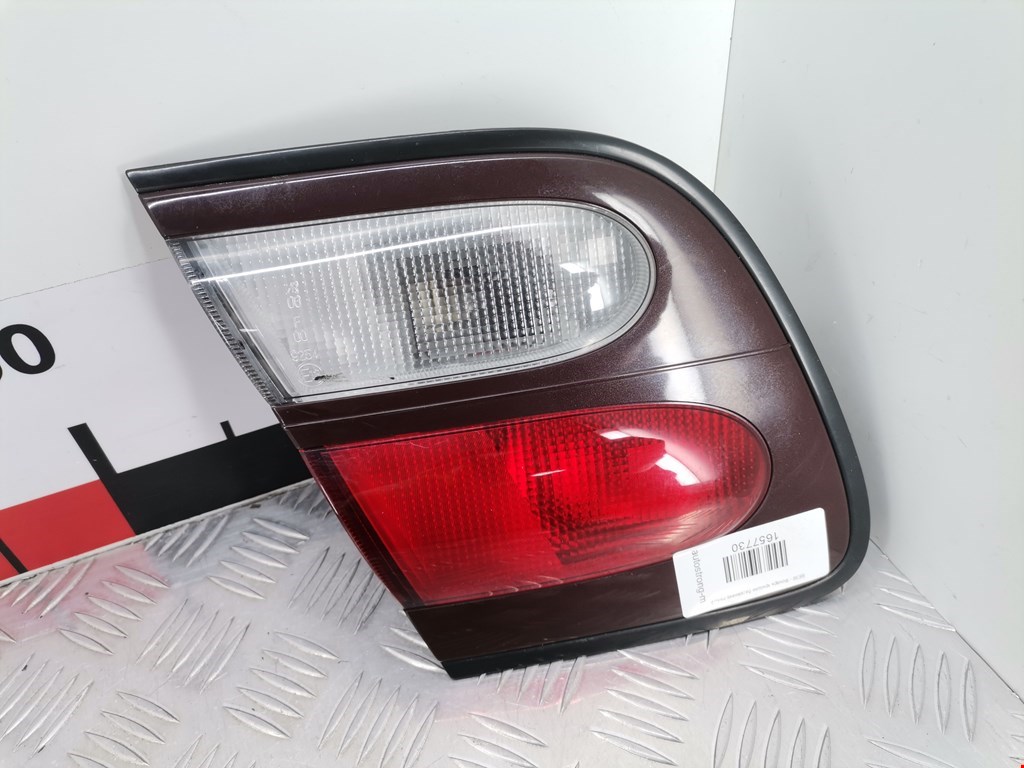 Фонарь крышки багажника левый Nissan Almera N15 купить в Беларуси