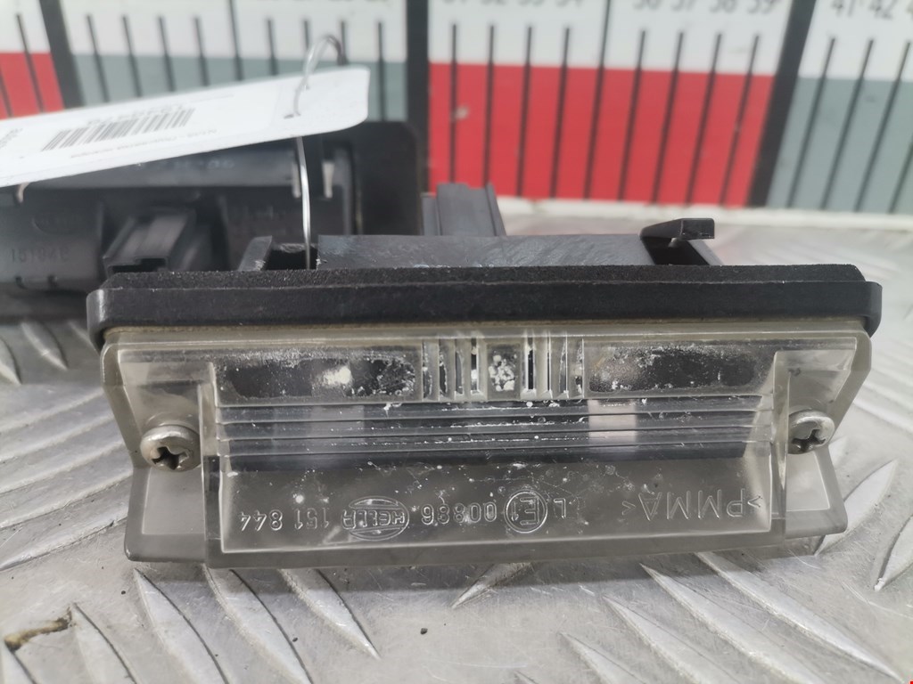 MR485387 Фонарь подсветки номера Mitsubishi Carisma (DA) (1999 - 2003) купить бу