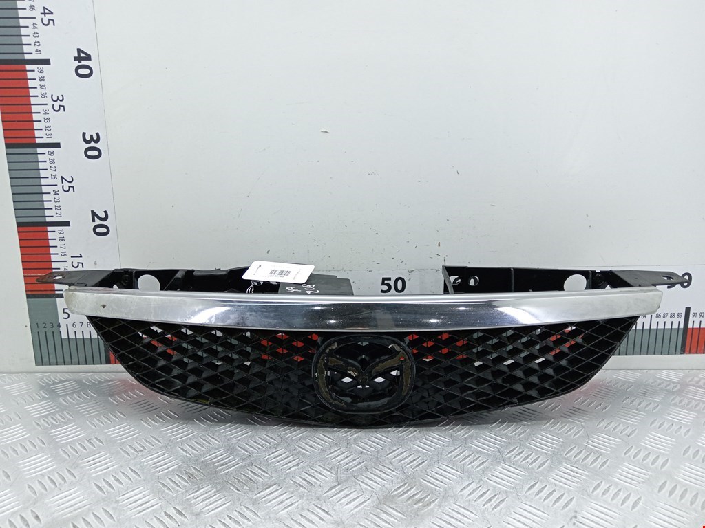 Решетка радиатора Mazda 323 BJ